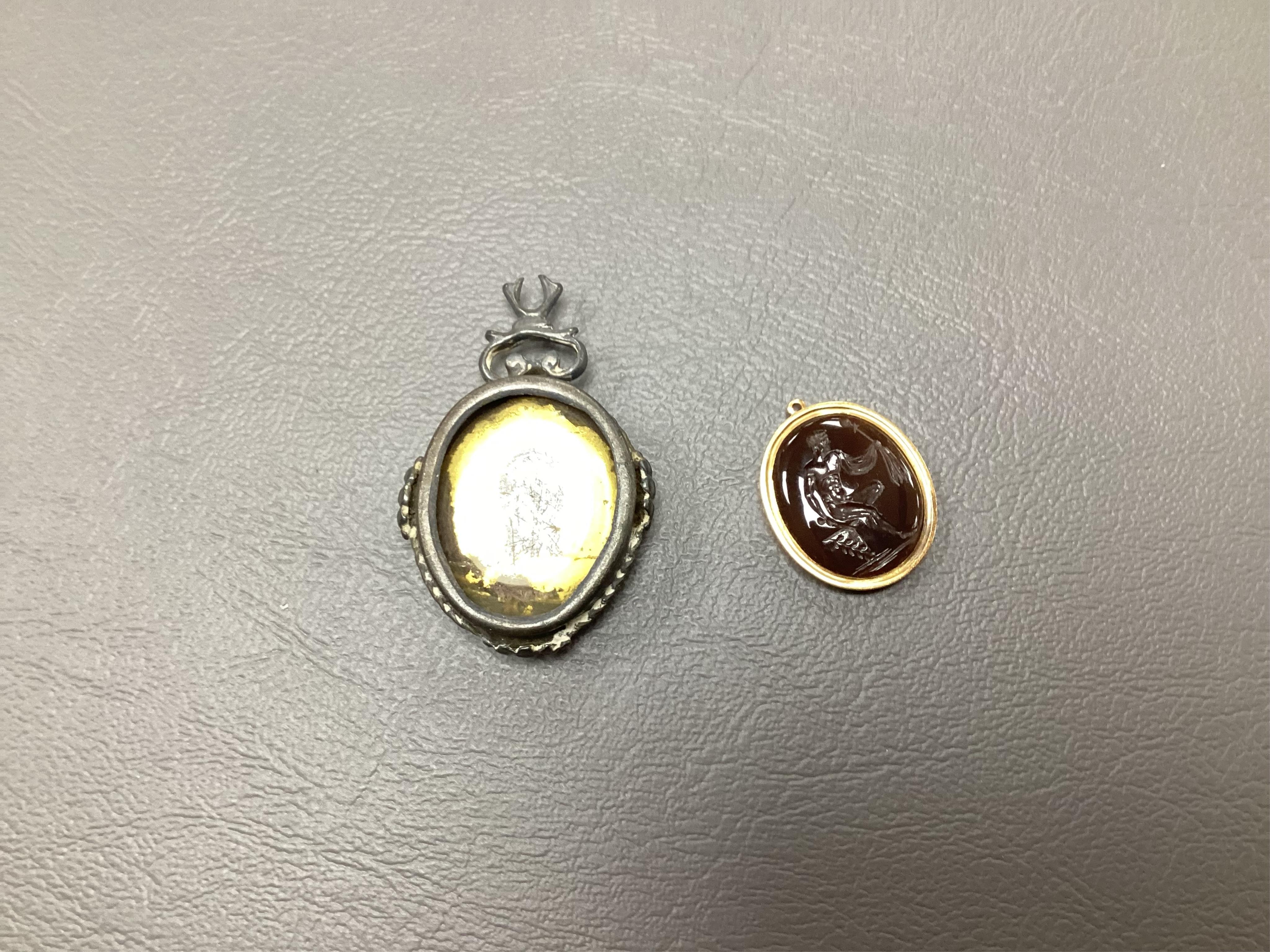 A 19th century yellow metal mounted intaglio pendant, assorted unmounted cameos, snuff box and collectables. Condition - varies
